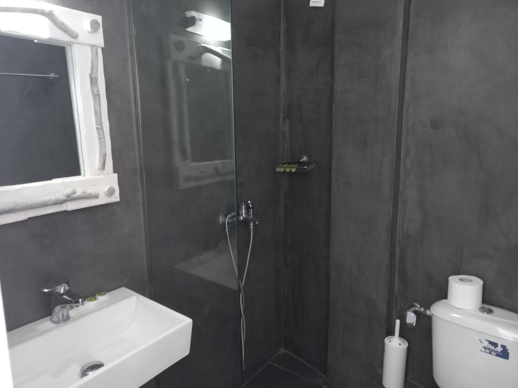 Three Harites Aparthotel Perissa  Quarto foto